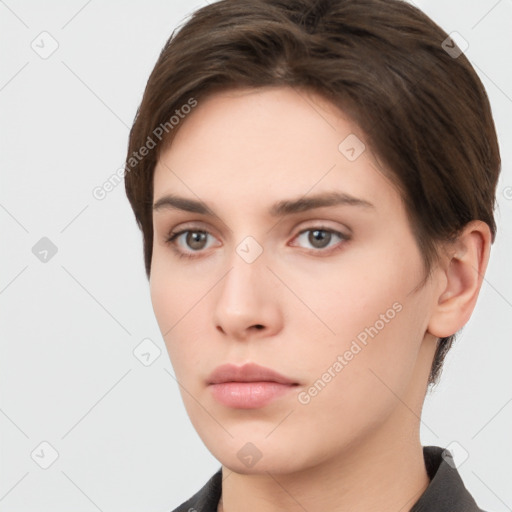 Neutral white young-adult female with short  brown hair and brown eyes