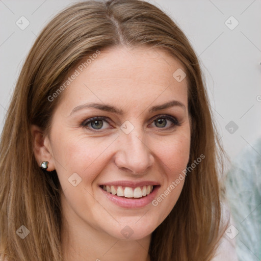 Joyful white young-adult female with long  brown hair and grey eyes