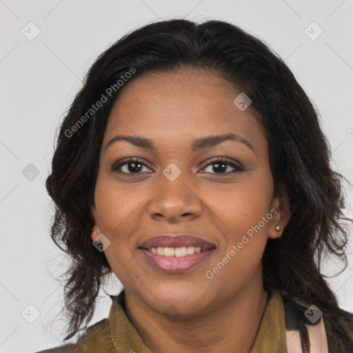 Joyful black young-adult female with long  brown hair and brown eyes