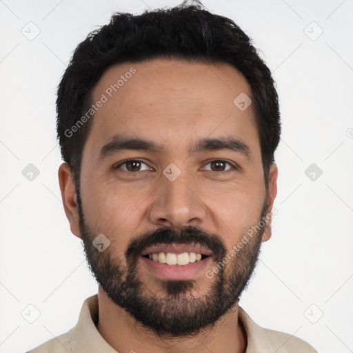 Joyful latino young-adult male with short  black hair and brown eyes