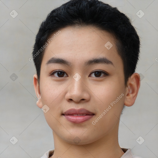 Joyful asian young-adult male with short  black hair and brown eyes