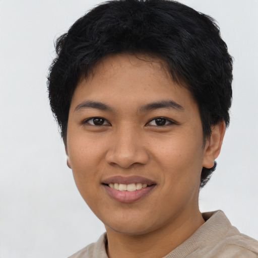 Joyful asian young-adult female with short  black hair and brown eyes