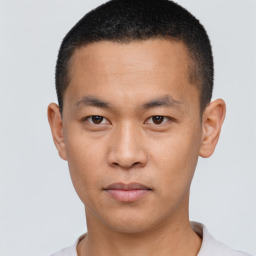 Neutral white young-adult male with short  black hair and brown eyes