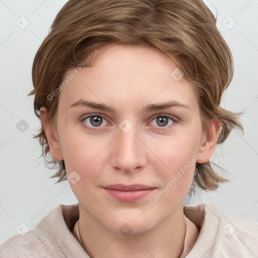 Joyful white young-adult female with medium  brown hair and blue eyes