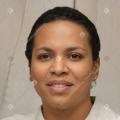 Joyful latino young-adult female with short  black hair and brown eyes