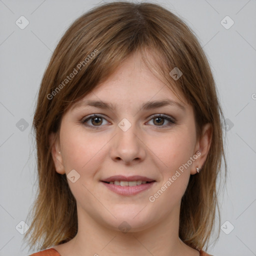 Joyful white young-adult female with medium  brown hair and grey eyes