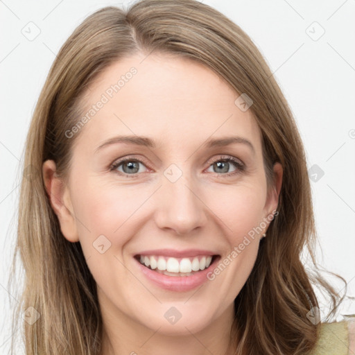 Joyful white young-adult female with long  brown hair and grey eyes