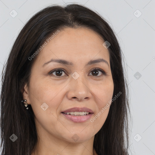 Joyful white adult female with long  brown hair and brown eyes