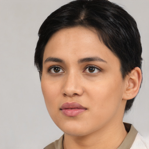 Neutral latino young-adult female with medium  black hair and brown eyes