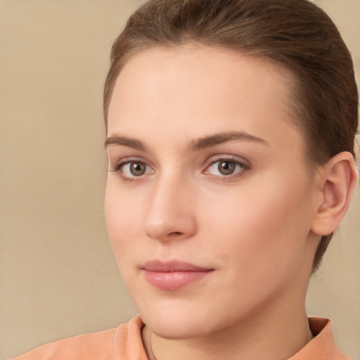 Neutral white young-adult female with short  brown hair and brown eyes