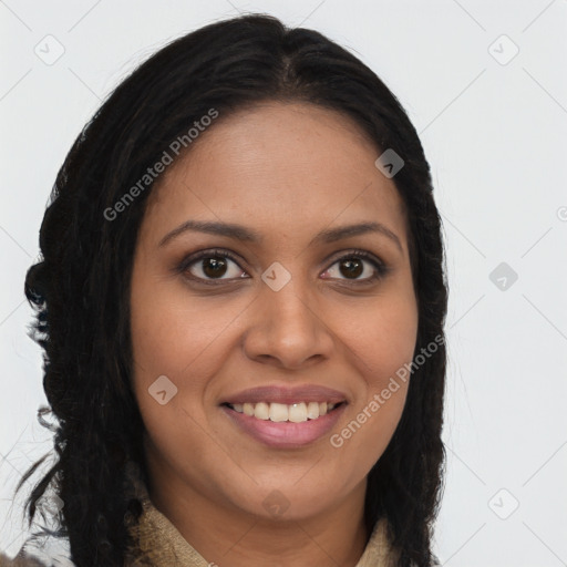 Joyful black young-adult female with long  brown hair and brown eyes