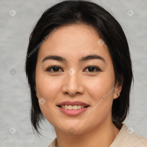 Joyful asian young-adult female with medium  brown hair and brown eyes