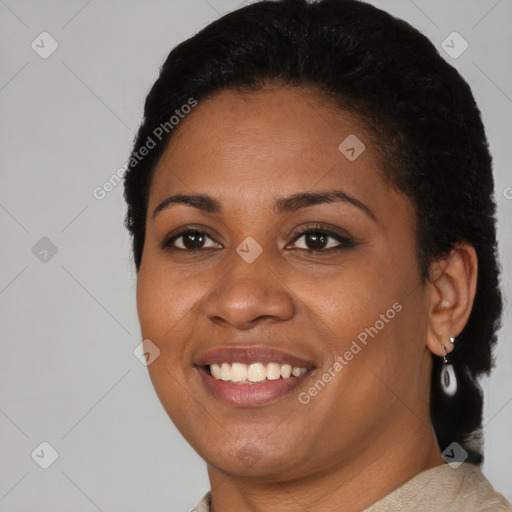 Joyful latino young-adult female with short  black hair and brown eyes