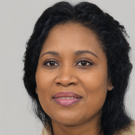 Joyful asian adult female with long  black hair and brown eyes