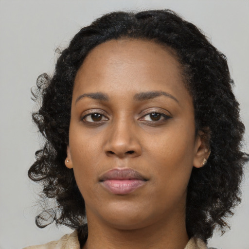 Neutral black young-adult female with long  black hair and brown eyes
