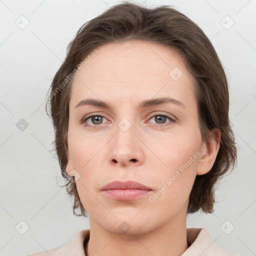 Neutral white young-adult female with medium  brown hair and grey eyes