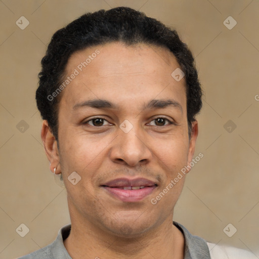 Joyful latino adult male with short  black hair and brown eyes