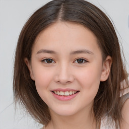 Joyful white child female with medium  brown hair and brown eyes