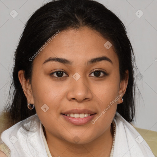 Joyful latino young-adult female with medium  brown hair and brown eyes