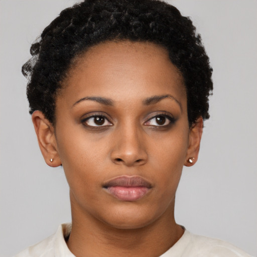 Neutral latino young-adult female with short  brown hair and brown eyes