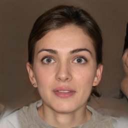 Neutral white young-adult female with short  brown hair and brown eyes