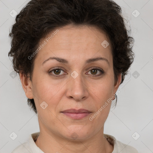 Joyful white adult female with short  brown hair and brown eyes