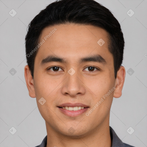 Joyful white young-adult male with short  black hair and brown eyes