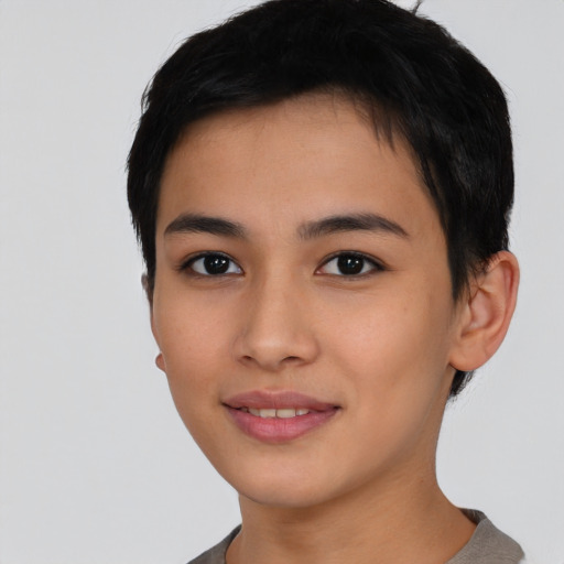 Joyful asian young-adult female with short  black hair and brown eyes