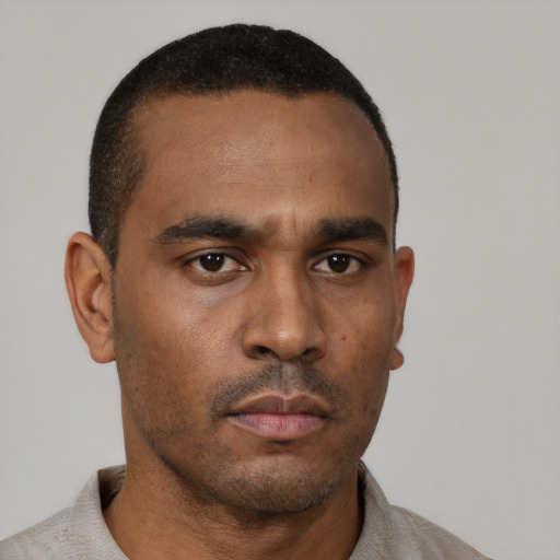 Neutral latino young-adult male with short  brown hair and brown eyes