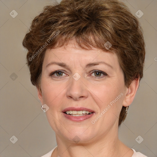 Joyful white adult female with short  brown hair and brown eyes