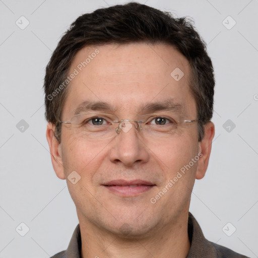 Joyful white adult male with short  brown hair and grey eyes