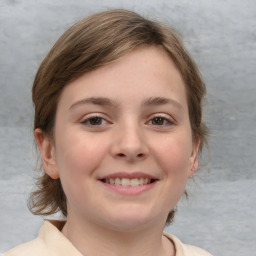 Joyful white child female with medium  brown hair and brown eyes