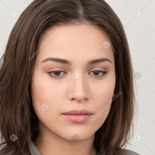 Neutral white young-adult female with long  brown hair and brown eyes