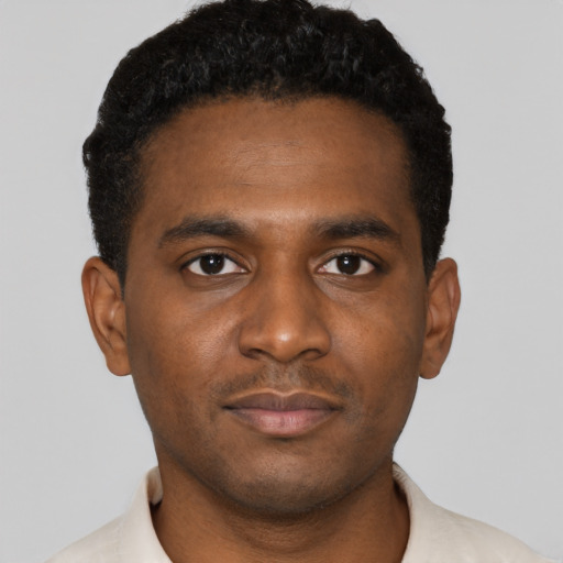 Neutral black young-adult male with short  black hair and brown eyes