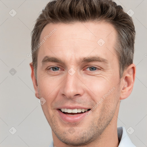 Joyful white young-adult male with short  brown hair and brown eyes