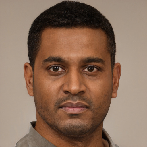 Neutral black young-adult male with short  brown hair and brown eyes