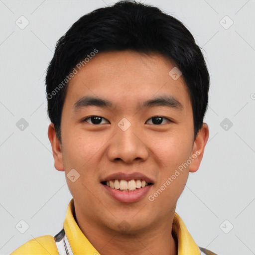 Joyful asian young-adult male with short  black hair and brown eyes