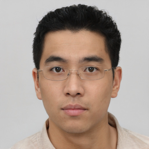 Neutral asian young-adult male with short  black hair and brown eyes