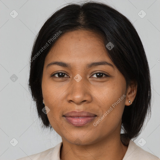 Joyful black adult female with medium  black hair and brown eyes