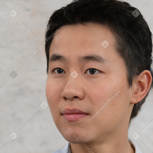 Neutral asian young-adult male with short  brown hair and brown eyes