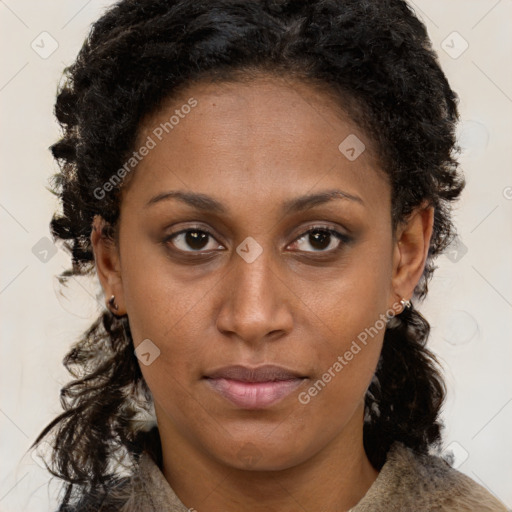 Neutral black young-adult female with medium  brown hair and brown eyes