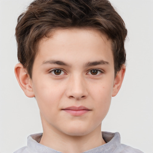 Joyful white child male with short  brown hair and brown eyes