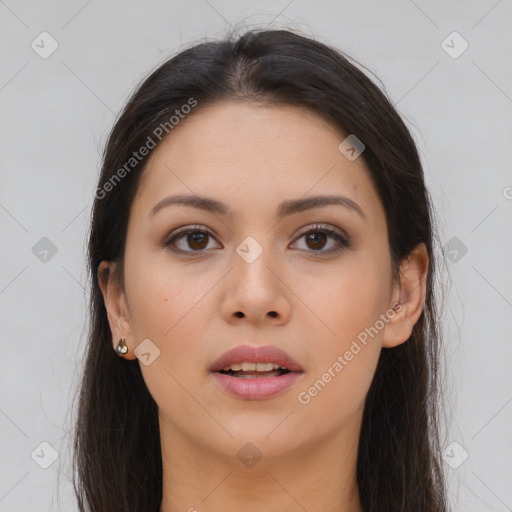 Joyful asian young-adult female with long  brown hair and brown eyes