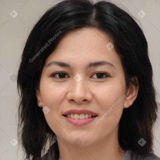 Joyful asian young-adult female with long  brown hair and brown eyes