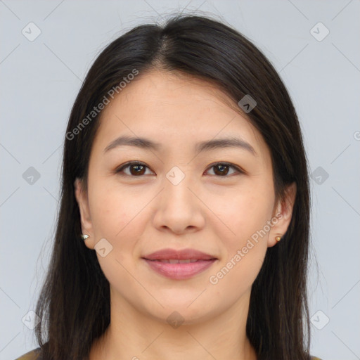 Joyful asian young-adult female with long  brown hair and brown eyes