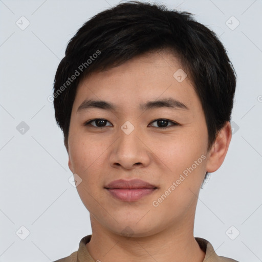 Joyful asian young-adult male with short  black hair and brown eyes