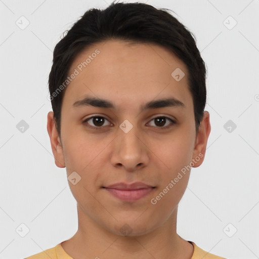 Joyful latino young-adult male with short  brown hair and brown eyes