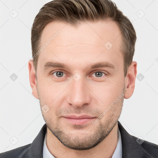 Neutral white young-adult male with short  brown hair and grey eyes