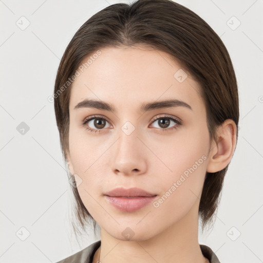 Neutral white young-adult female with medium  brown hair and brown eyes