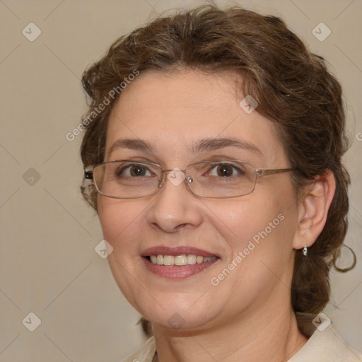 Joyful white adult female with medium  brown hair and green eyes